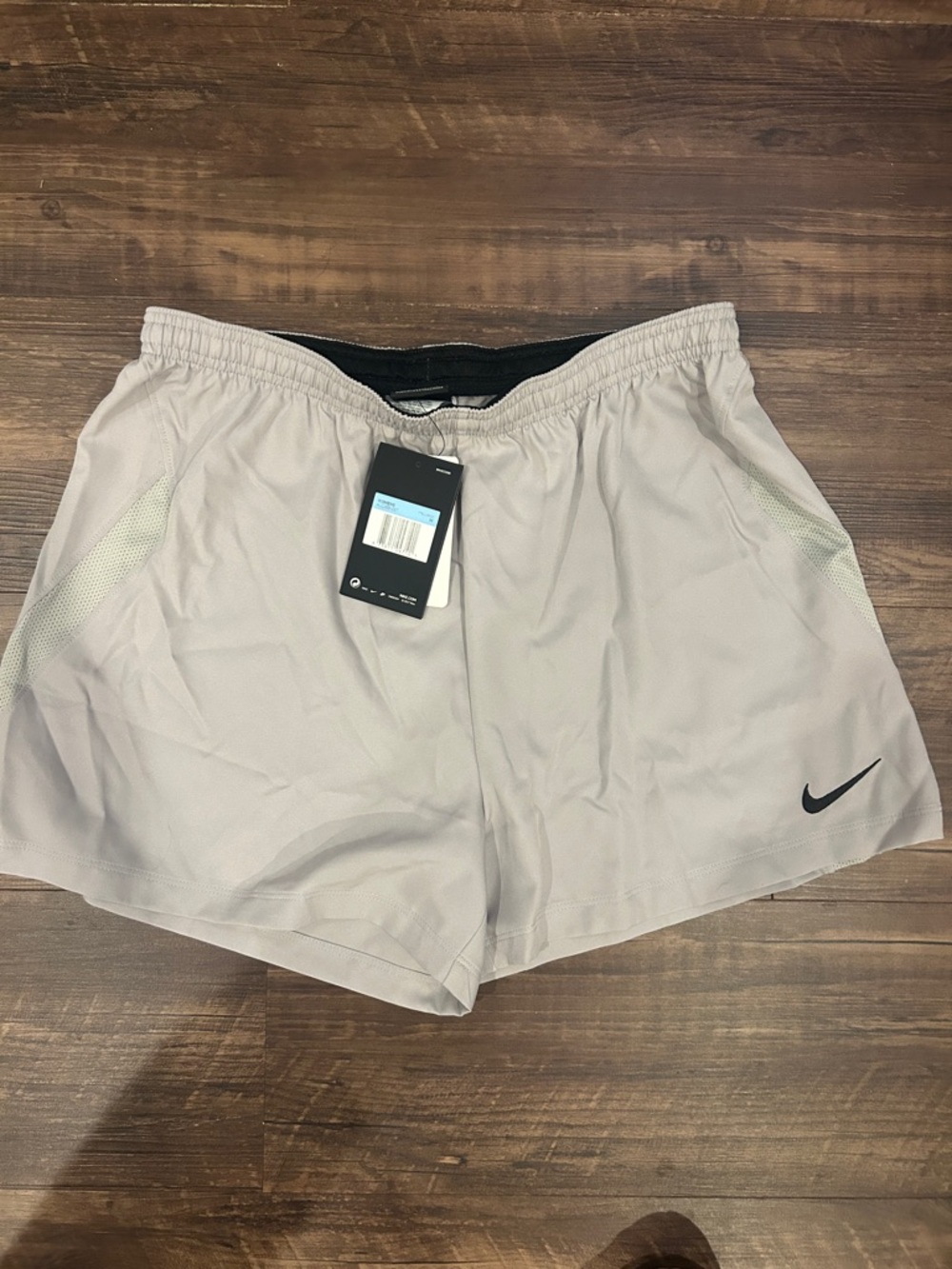 Nike women’s Light Gray Athletic Running Shorts